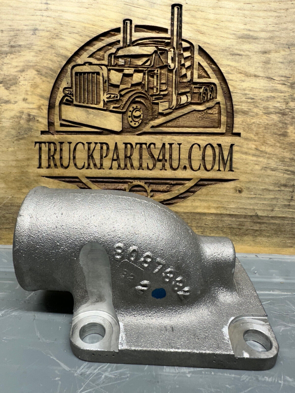 Front view of 8087332 OEM Mack / Volvo part showing factory casting